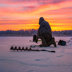 Man ice fishing 