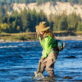 Woman fly fishing