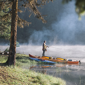 Woman fly fishing