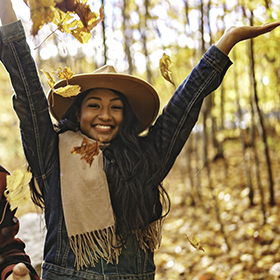 A young man and woman outdoors hiking