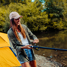 Woman fly fishing