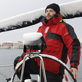 Man on boat during winter
