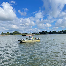 Man boating at lake
