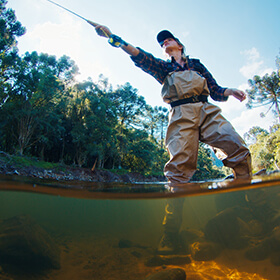 Woman fly fishing