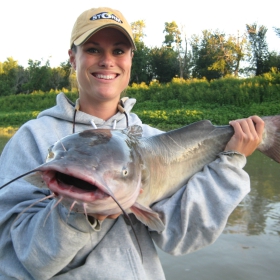 Women angler fishing catfish in minnesota