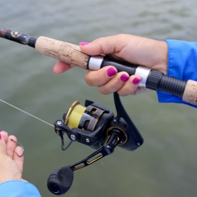 women angler using a saltwater fishing gear for beginners 